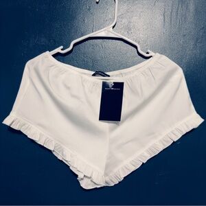 Brandy Melville White Ruffle Hem Shorts